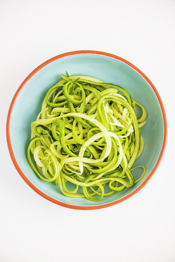 A Bowl Of Courgette Pasta Photograph by Hein Van Tonder