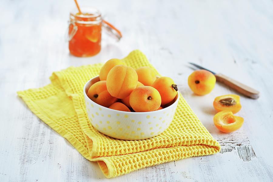 A Bowl Of Fresh Apricots For Making Jam Photograph by Mariola Streim