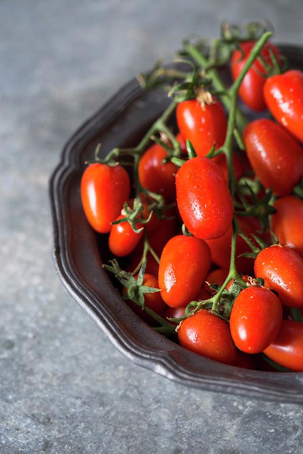 A Bowl Of Fresh Vine Tomatoes Photograph by Malgorzata Laniak