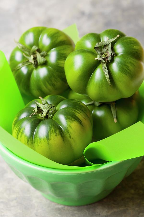 A Bowl Of Green Sicilian Tomatoes Photograph by Hilde Mche