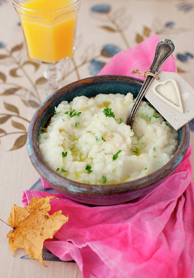 A Bowl Of Mashed Turnips With Truffle Oil And Parsley; Spoon Photograph by Strokin, Yelena