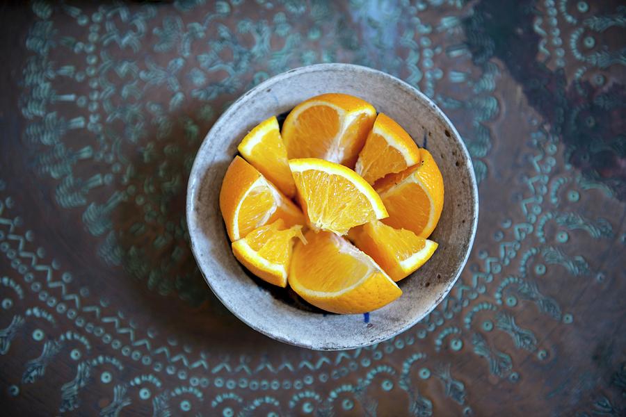 A Bowl Of Orange Slices Photograph by Yehia Asem El Alaily