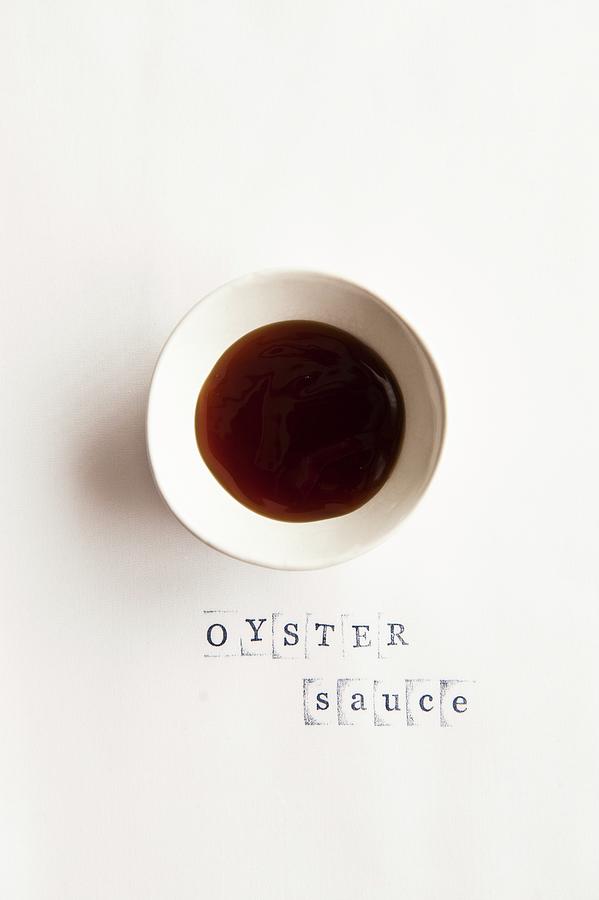 A Bowl Of Oyster Sauce Photograph by Studer, Veronika