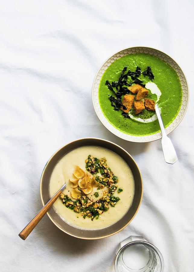 A Bowl Of Parsnip Soup With Hazelnutparsley Gremolata And Parsnip Chips Next To A Bowl Of