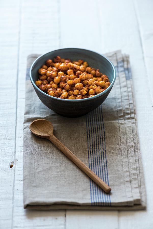 A Bowl Of Roasted Chickpeas Photograph by Hein Van Tonder