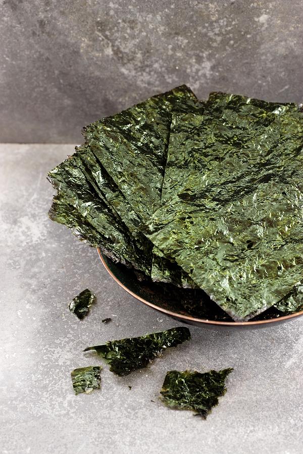 A Bowl Of Seaweed Chips Photograph by Petr Gross