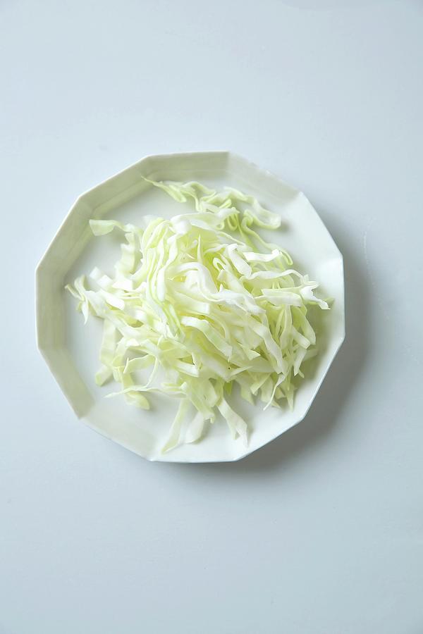 A Bowl Of Sliced Pointed Cabbage Photograph by Jalag / Stefan Bleschke