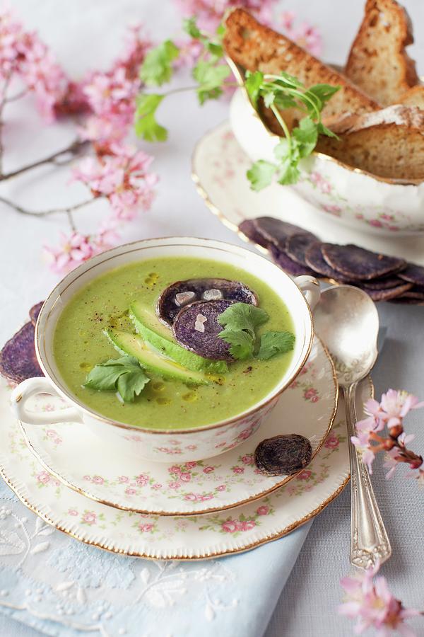 A Bowl Of Spring Green Soup With Avocado And Beet Chips Photograph by Strokin, Yelena