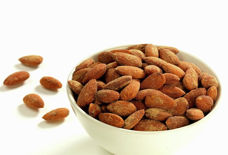 A Bowl Of Sweet Roasted Almonds Photograph by Robert Morris