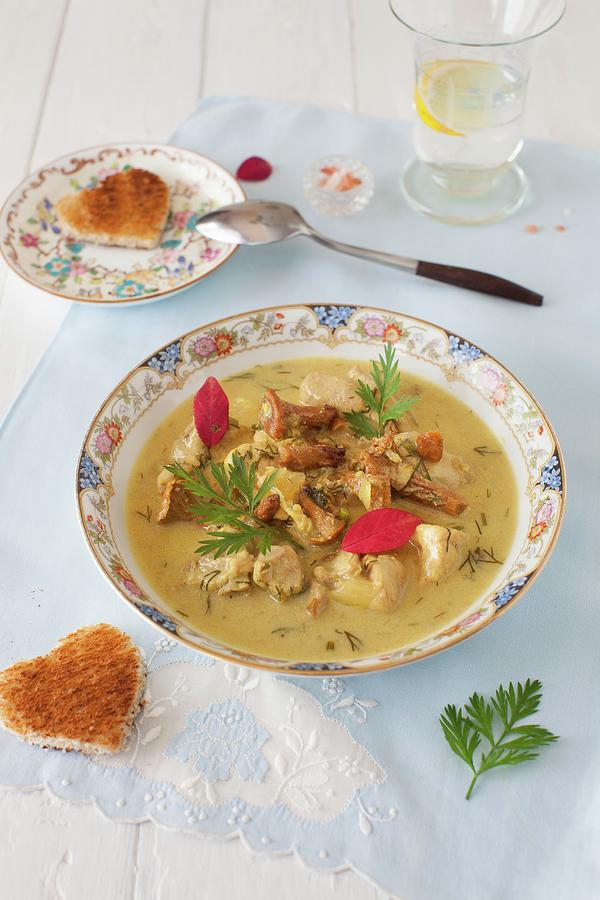 A Bowl Of Turkey Soup With Mushrooms With Heart Shaped Toasts Photograph by Yelena Strokin