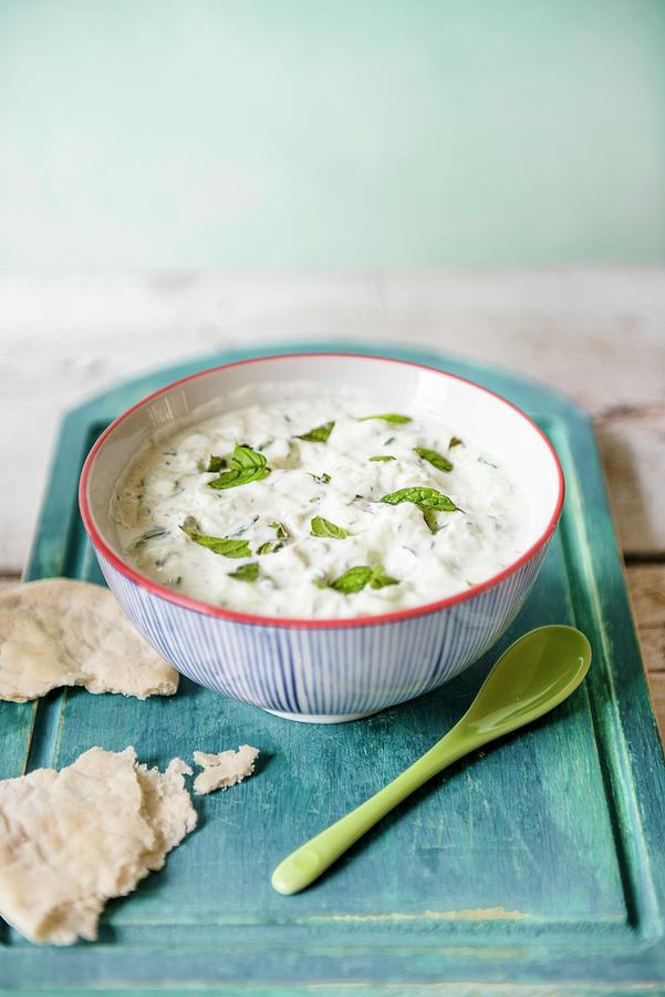 A Bowl Of Tzatziki With Flatbread Photograph by Magdalena Hendey