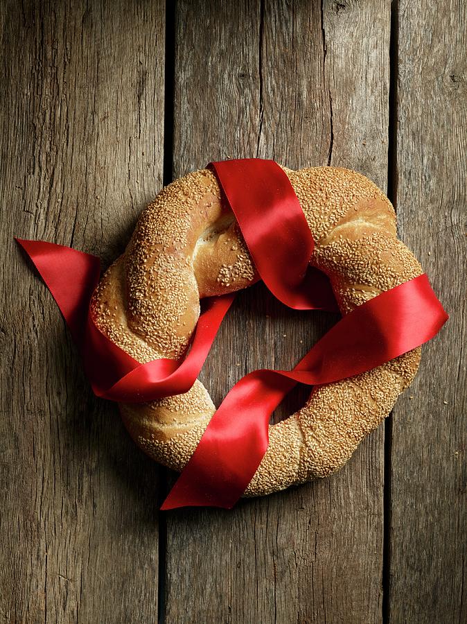 A Bread Wreath With Sesame Seeds For Christmas Photograph by Rene Comet
