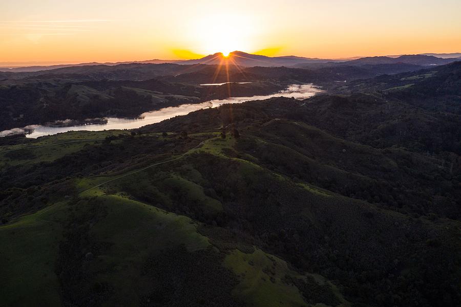 Nature Photograph - A Brilliant Sunrise Greets The Hills by Ethan Daniels