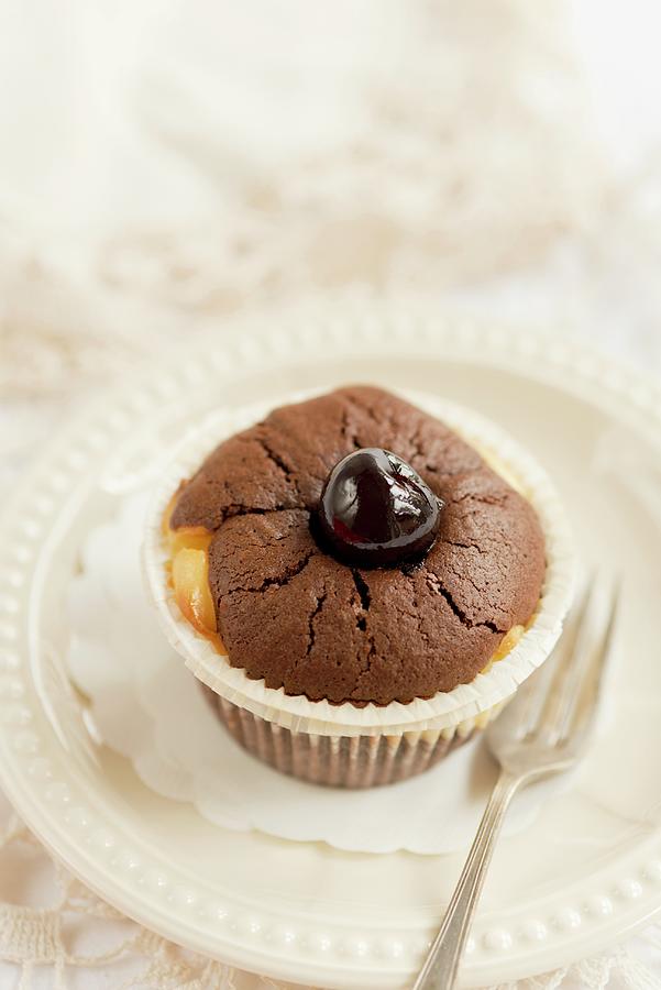 A Brownie Muffin With Cherries Photograph by Ewa Rejmer