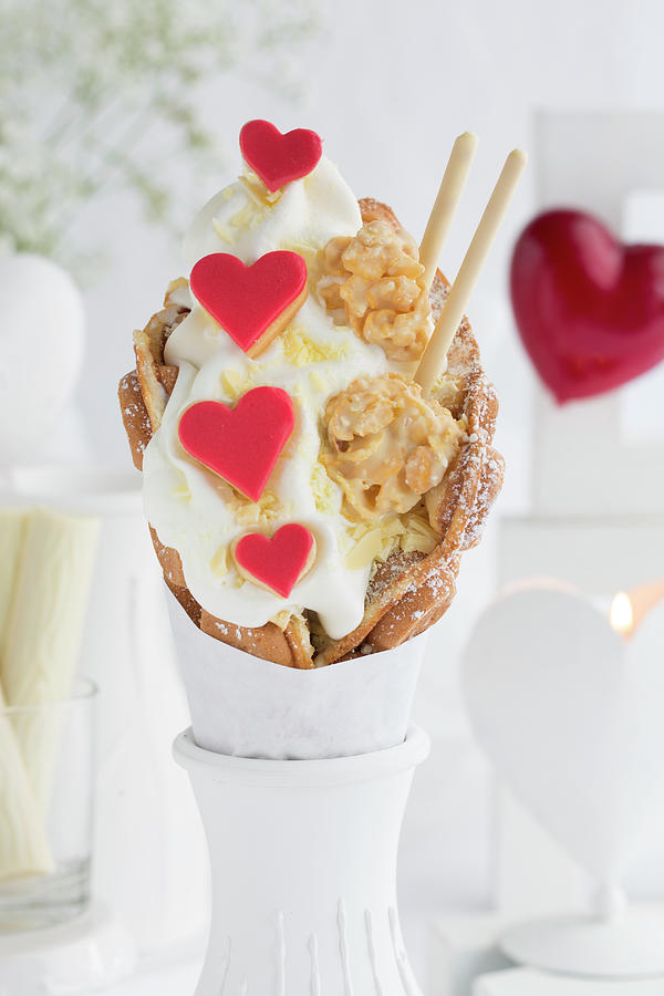 A Bubble Waffle With Frozen Yoghurt, Heart-shaped Biscuits, Crispy Chocolates And Chocolate Photograph by Esther Hildebrandt