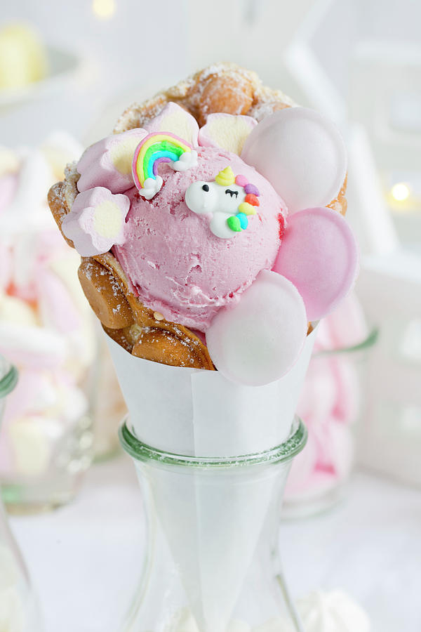 A Bubble Waffle With Strawberry Ice Cream And Unicorn Decorations Photograph by Esther Hildebrandt
