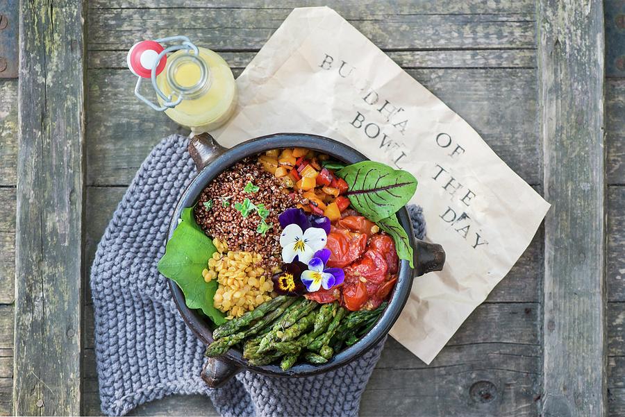 A Buddha Bowl With Lentils, Asparagus, Tomatoes, Peppers, Lettuce And Pansies Photograph by Fotografie-lucie-eisenmann