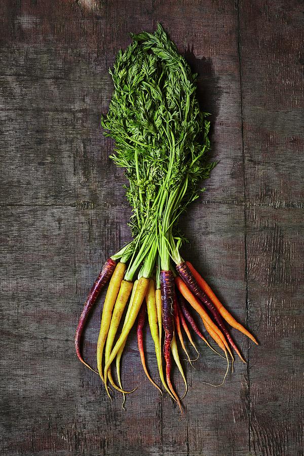A Bunch Of Colourful Carrots Photograph by Tim Atkins Photography