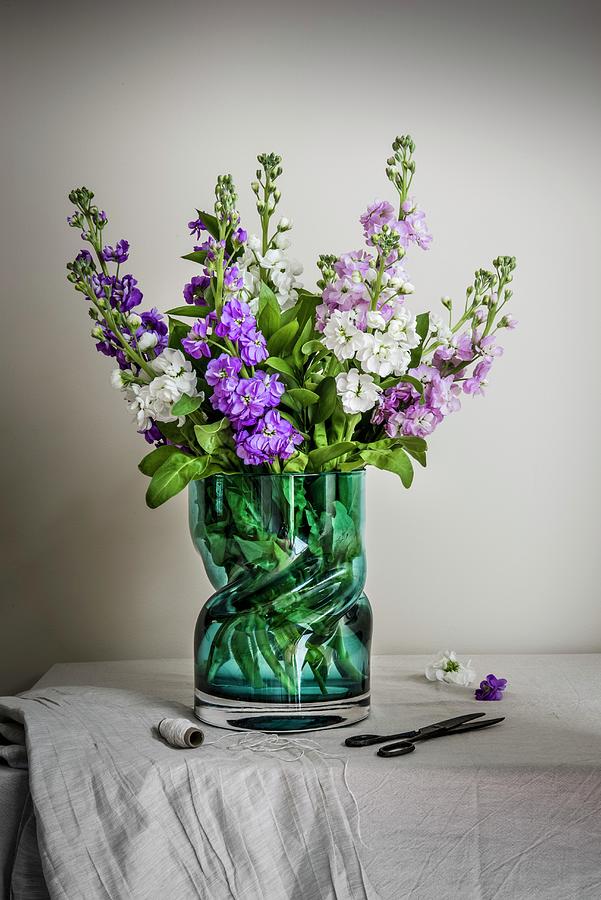 A Bunch Of Flowers On A Table Photograph by Magdalena Hendey