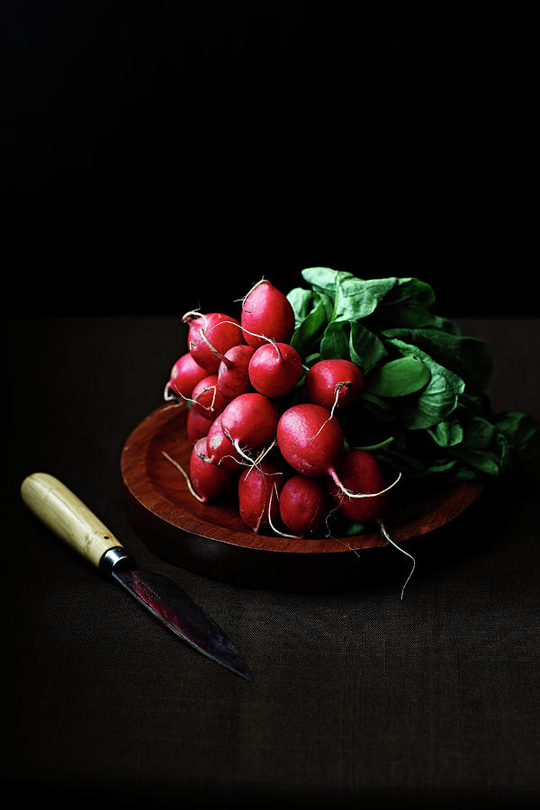 A Bunch Of Radishes On Wooden Chopping Photograph by Martin Poole