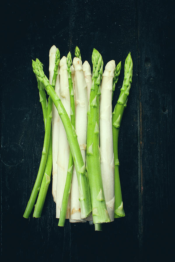 A Bunch Of White And Green Asparagus Photograph by Kfir Harbi
