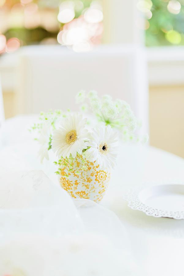 Summer Photograph - A Bunch Of White Flowers Decorating A Table by Au Petit Gout Photography Llc