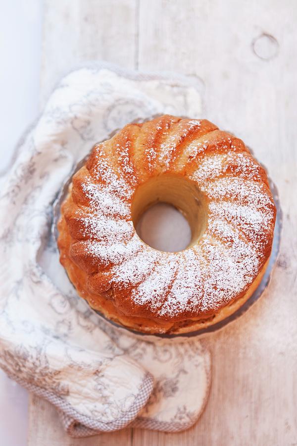 A Bundt Cake Dusted With Icing Sugar seen From Above Photograph by Anneliese Kompatscher