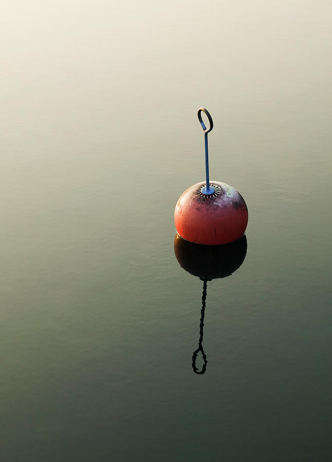 A Buoy In Calm Water Photograph by Charlie Drevstam, Johner