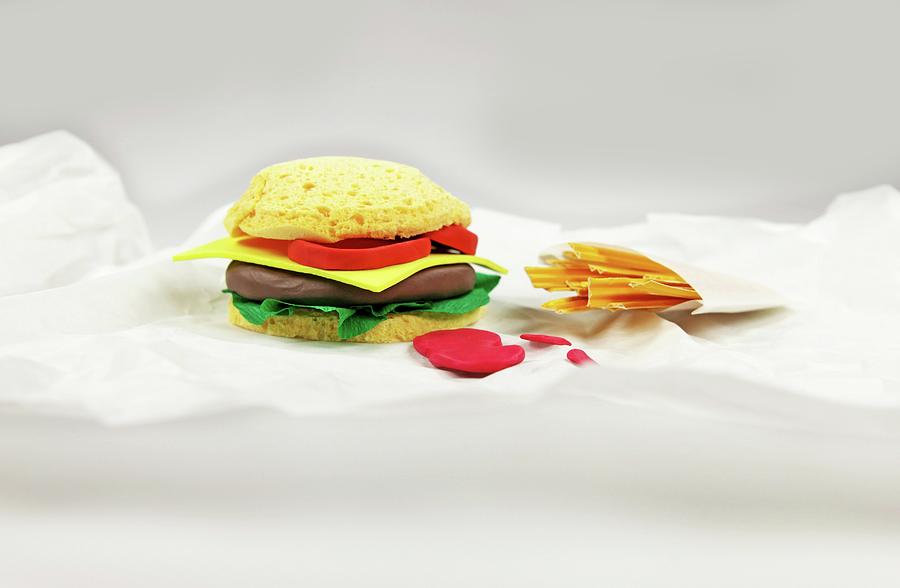 A Burger And Fries Made From Paper Photograph by Jalag-fotostudio,