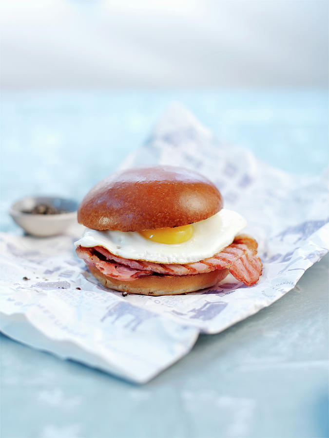 A Burger With Bacon And Fried Egg Photograph by Ian Garlick