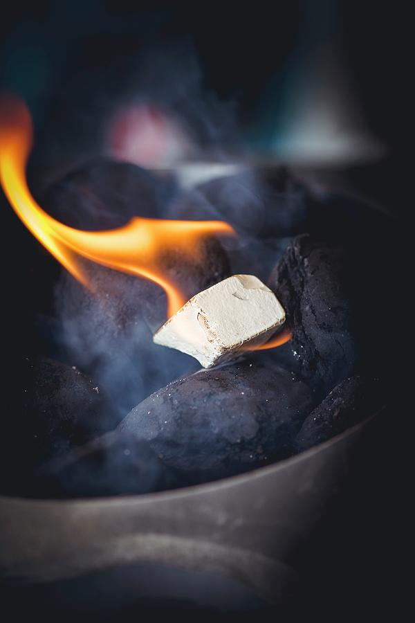 A Burning Barbecue Lighter Photograph by Eising Studio
