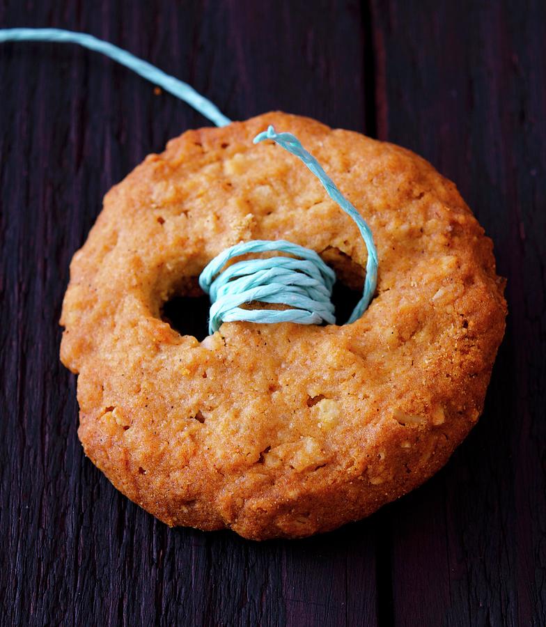 A Button Biscuit With A String Photograph by Udo Einenkel