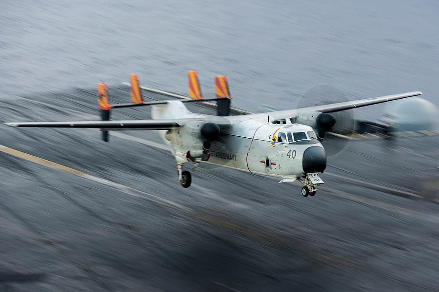 Transportation Photograph - A C-2a Greyhound Lands On The Flight by Stocktrek Images