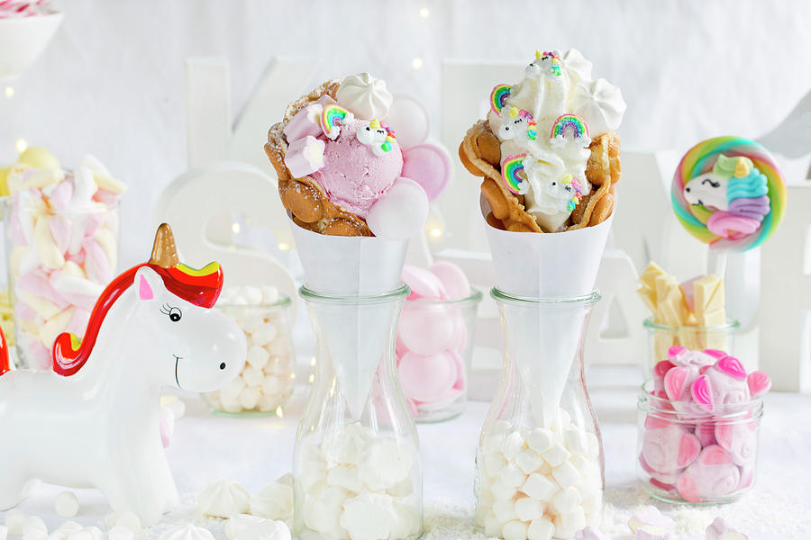 A Candy Bar Table With Bubble Waffles And Unicorn Decorations Photograph by Esther Hildebrandt