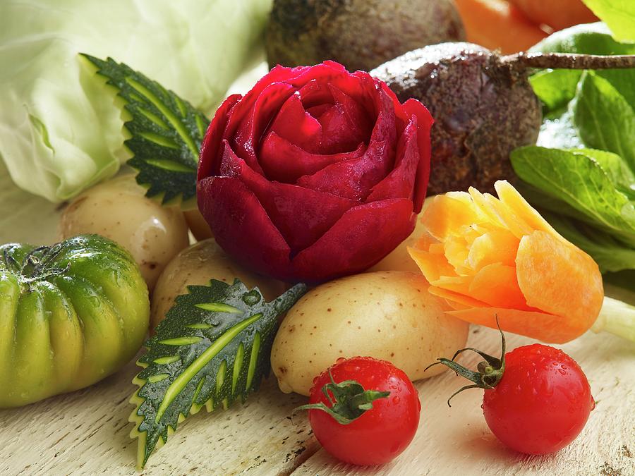 A Carved Beetroot Rose, Carrot Flower And Various Types Of Vegetables Photograph by Studio R. Schmitz