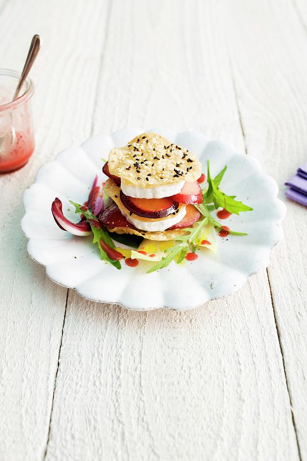 A Cheese And Plum Tower With Crispy Sesame Seed Chips Photograph by Michael Wissing