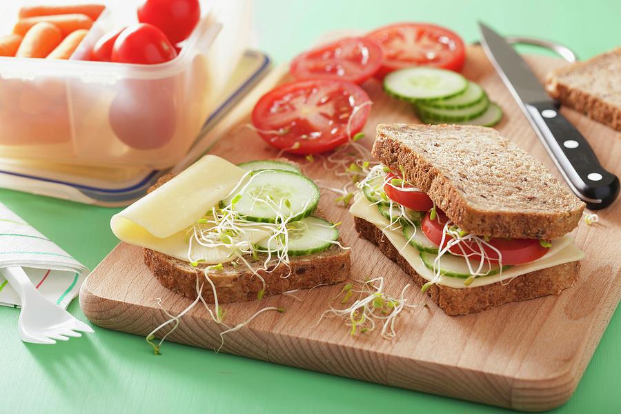 A Cheese, Cucumber, Tomato And Bean Sprout Sandwich For Lunch Box Photograph by Olga Miltsova