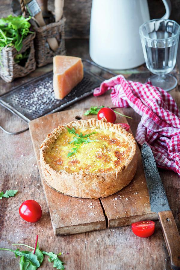 A Cheese Pie On A Rustic Wooden Board Photograph by Irina Meliukh