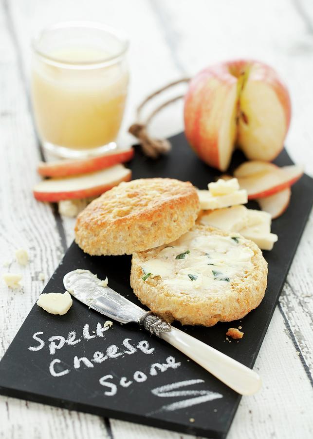 A Cheese Scone With Herb Butter, Cheese And Apple Photograph by Jane Saunders