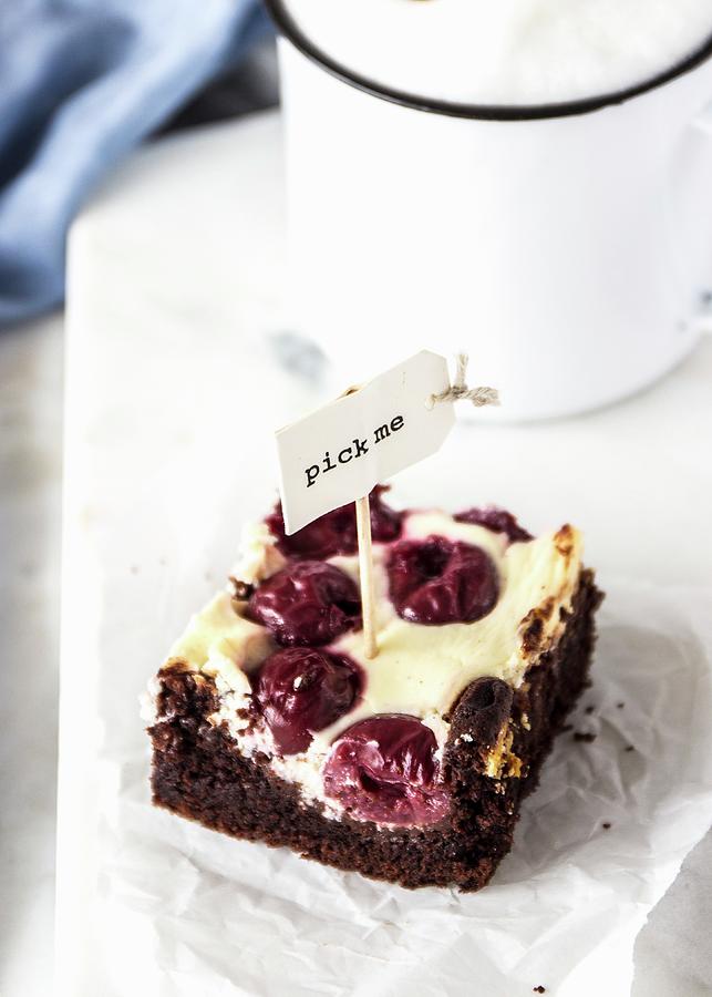 A Cheesecake Brownie With Sour Cherries Photograph by Emma Friedrichs