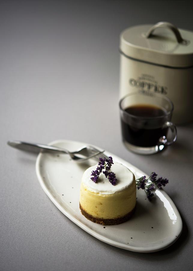 A Cheesecake Torte On A Serving Plate With A Cup Of Coffee Photograph by Lisa Rees