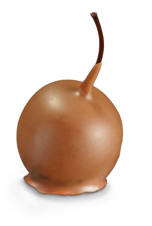A Cherry Praline Covered In Milk Chocolate Glaze Photograph by Bodo A. Schieren