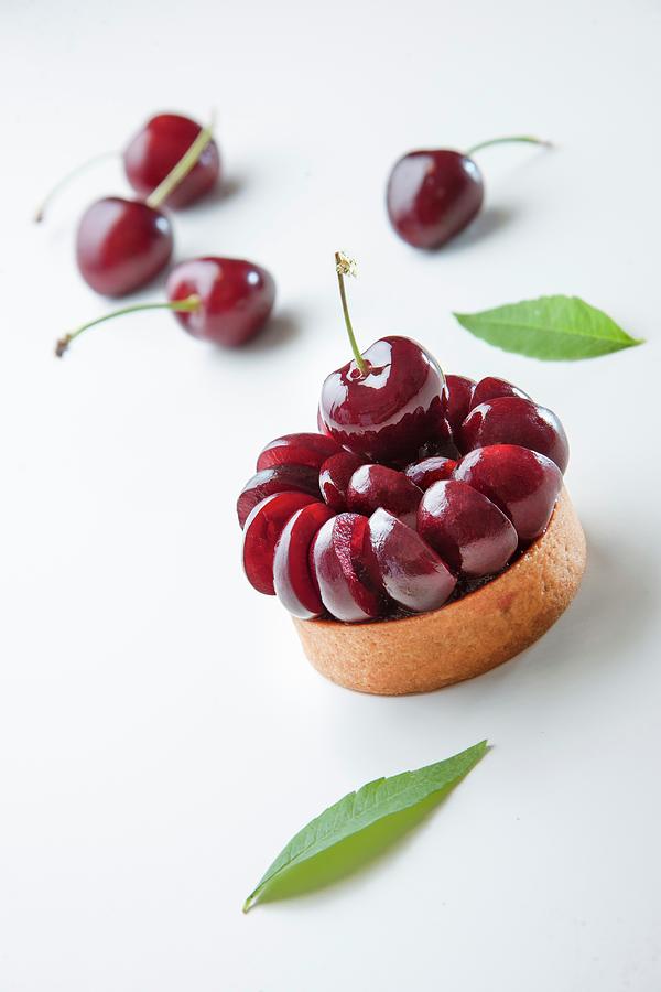 A Cherry Tartlet Photograph by Christophe Madamour