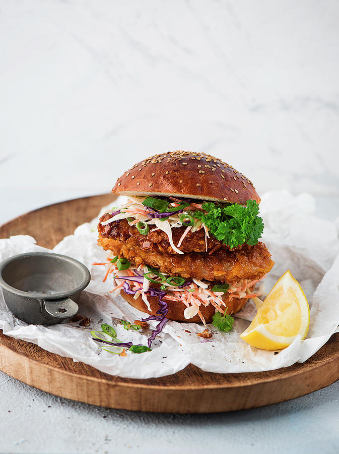 A Chicken Burger With Coleslaw Photograph by Ewgenija Schall - Pixels