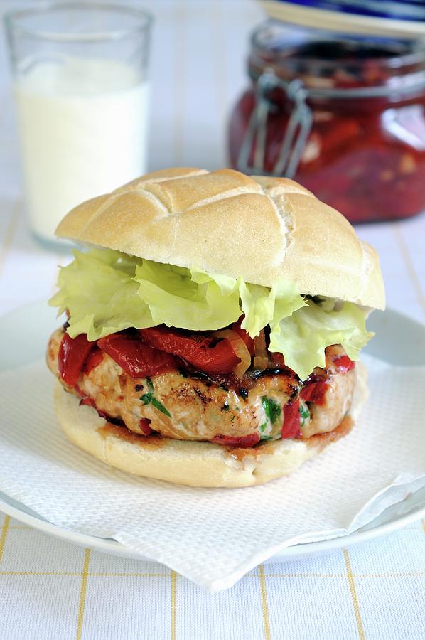 A Chicken Burger With Roasted Pepper Relish On A Ciabatta Bun ...