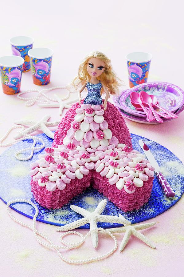 A Childs Birthday Cake With A Mermaid Doll Photograph by Young, Andrew