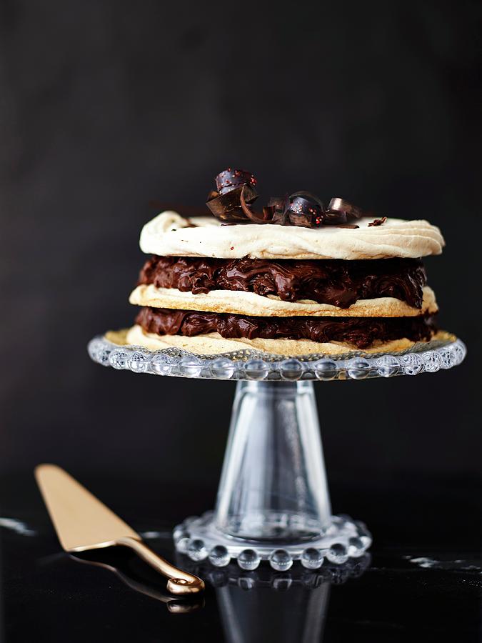 A Chilli And Chocolate Cream Dacquoise On A Cake Stand Photograph by Great Stock!