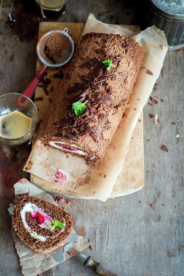 A Chocolate And Mascarpone Swiss Roll With Cherry Filling Photograph by Irina Meliukh