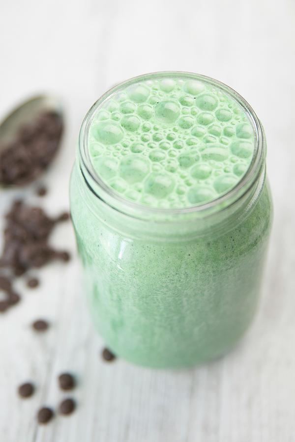 A Chocolate And Mint Smoothie In A Glass Photograph by Elle Brooks