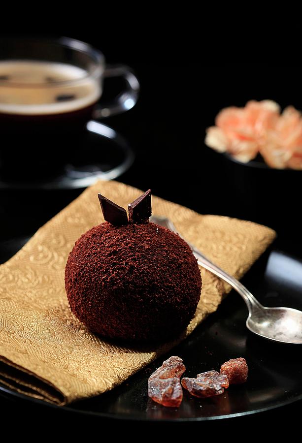 A Chocolate Ball And A Cup Of Coffee Photograph by Grudzinska-sarna, Anna